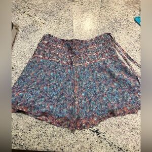 Silk tiered skirt with micro floral print.